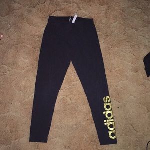 black adidas leggings with sparkly gold lettering